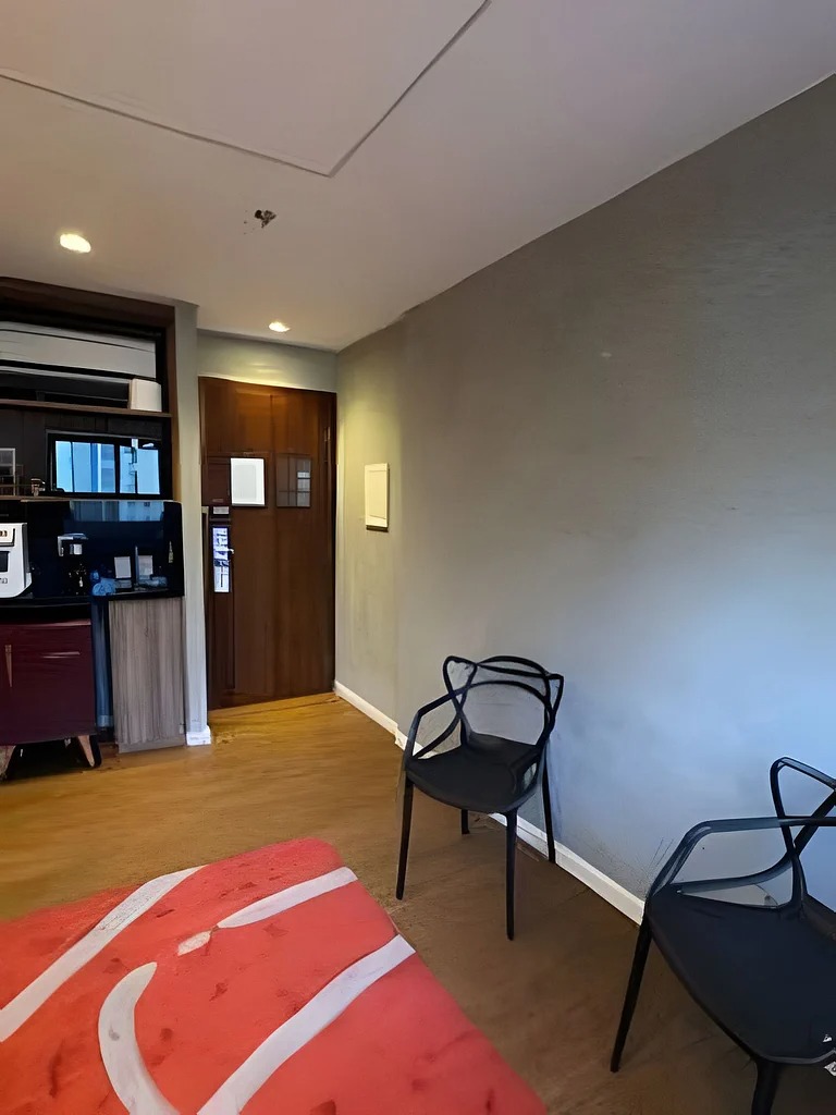 Apartamento Jardim Paulista — Sala com mini cozinha e cadeiras